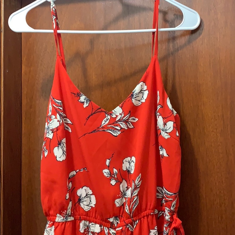 BRAND NEW! Never worn before. Floral One-Piece.